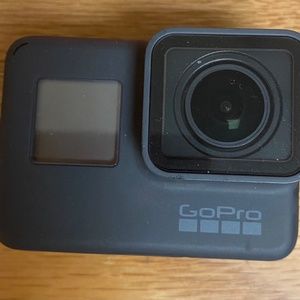 GoPro Hero 5 w/ Attachments and Carrying Case
